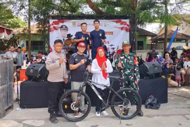 
Sambut HUT RI ke-81, Pemdes Cikarageman Gelar Gerak Jalan Santai